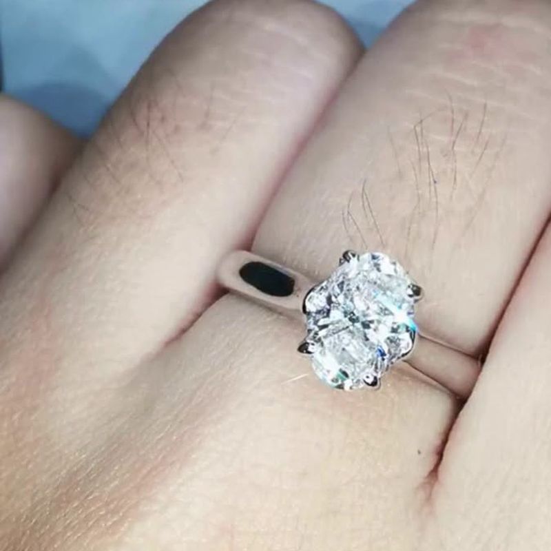 Oval Cut Solitaire Ring - natural diamonds in 18K Japan gold.